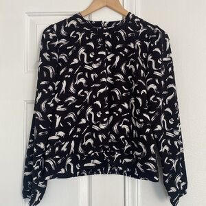 Nine West modern black blouse with solid knot hem.